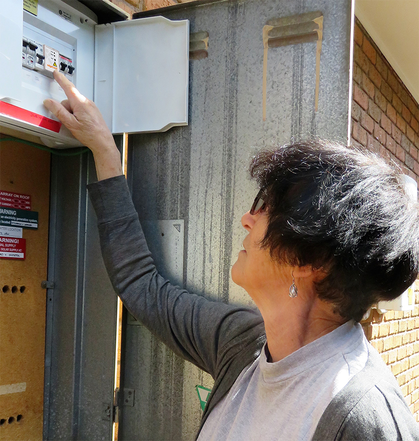 The compact device is installed within the home's switchboard